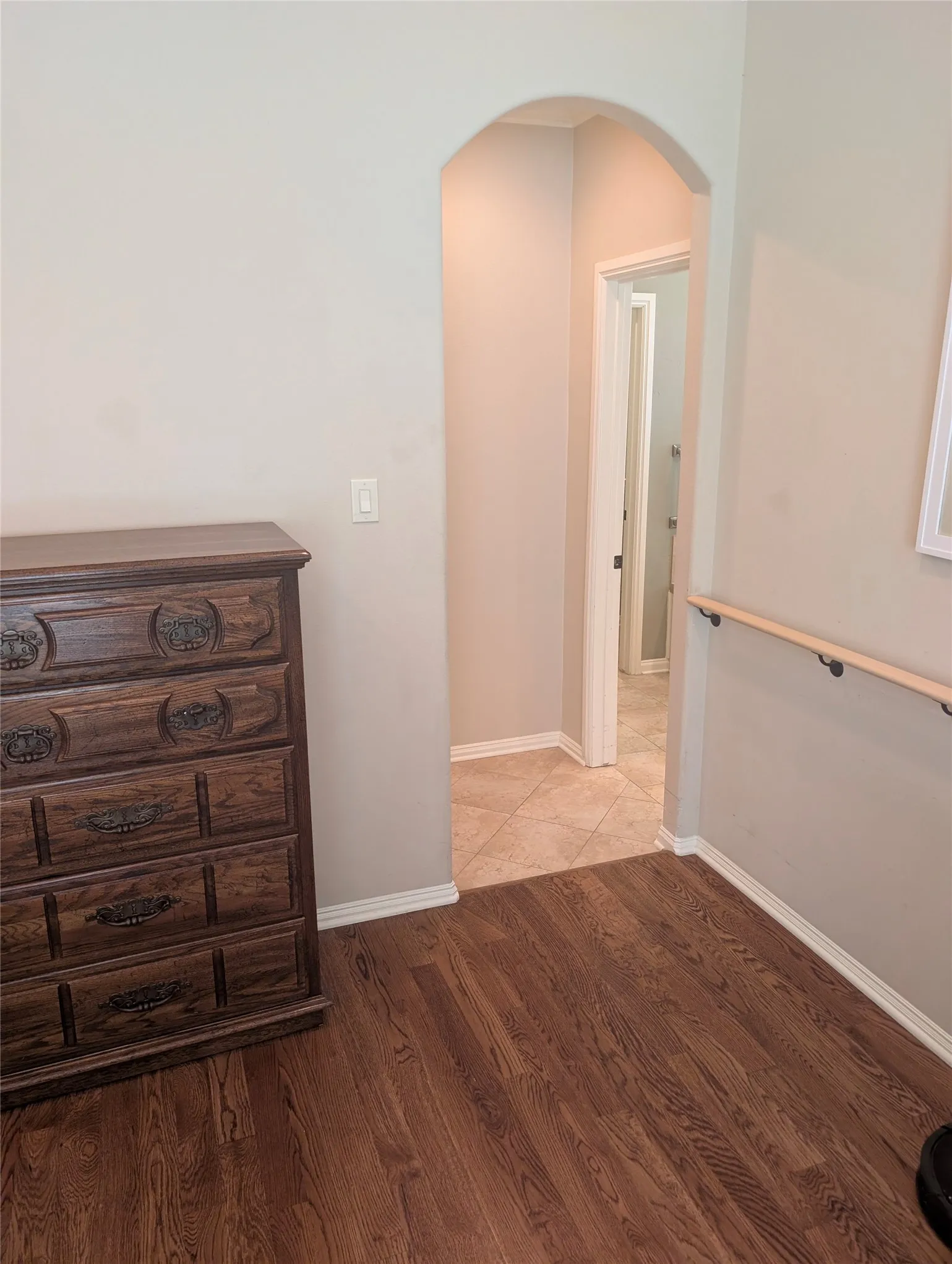 Handrail accessibility at entry to the primary bathroom.