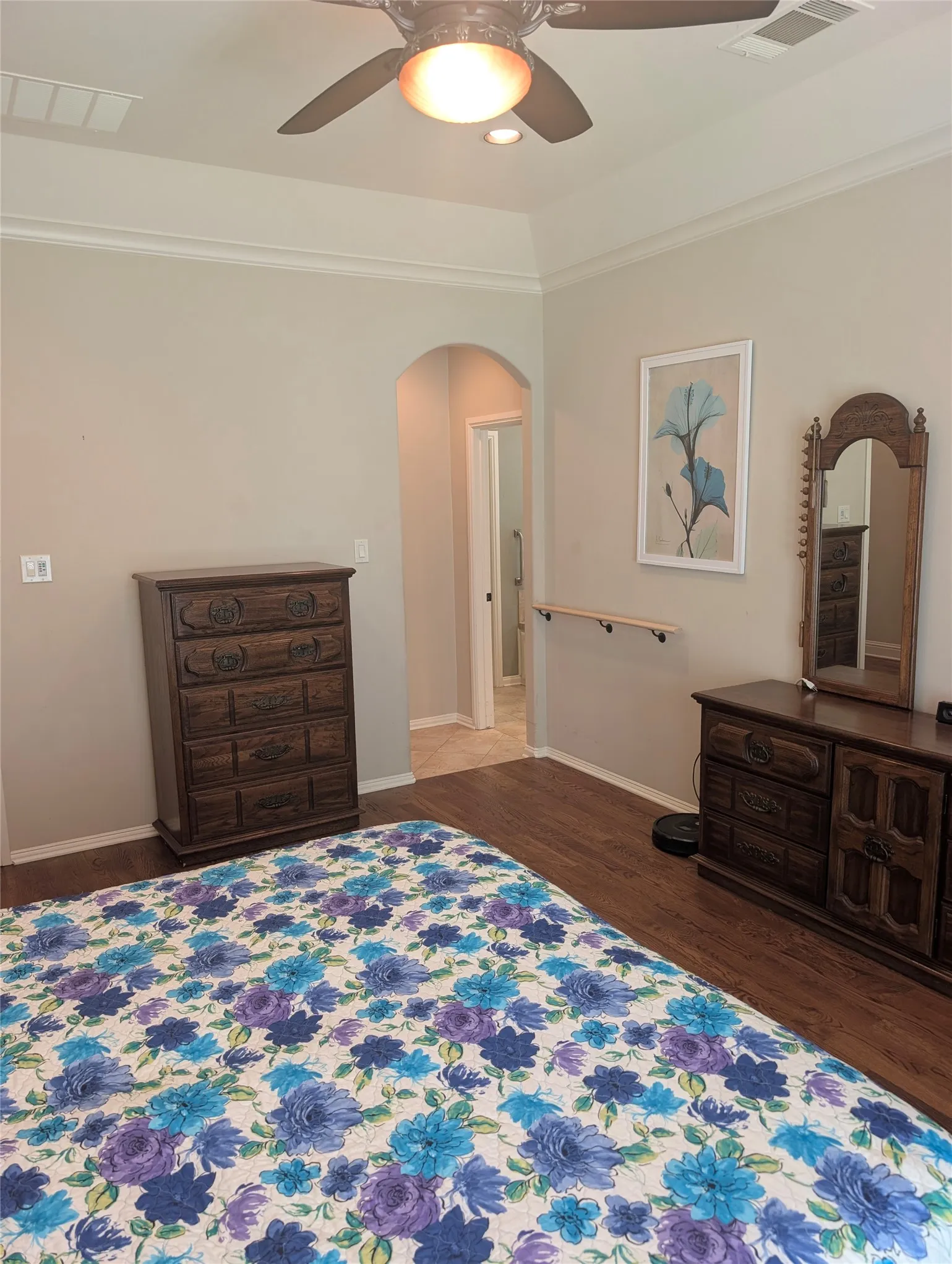 Primary bedroom and bathroom have accessibility features such as handrails.