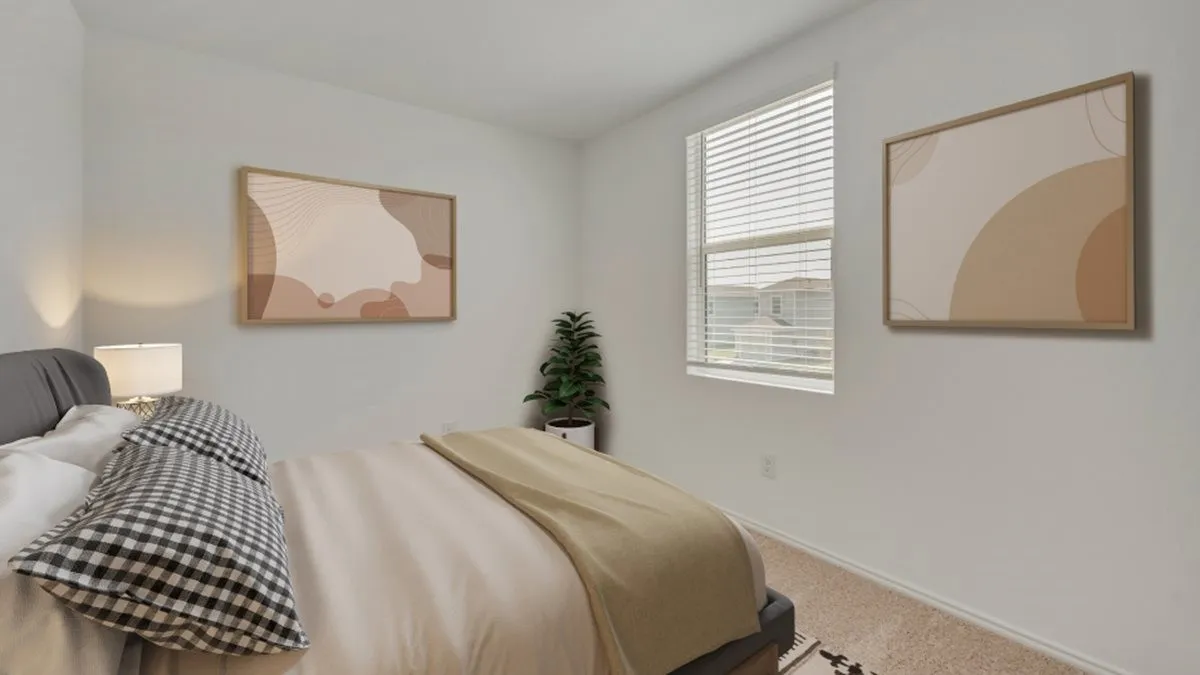 Bedroom featuring carpet and multiple windows