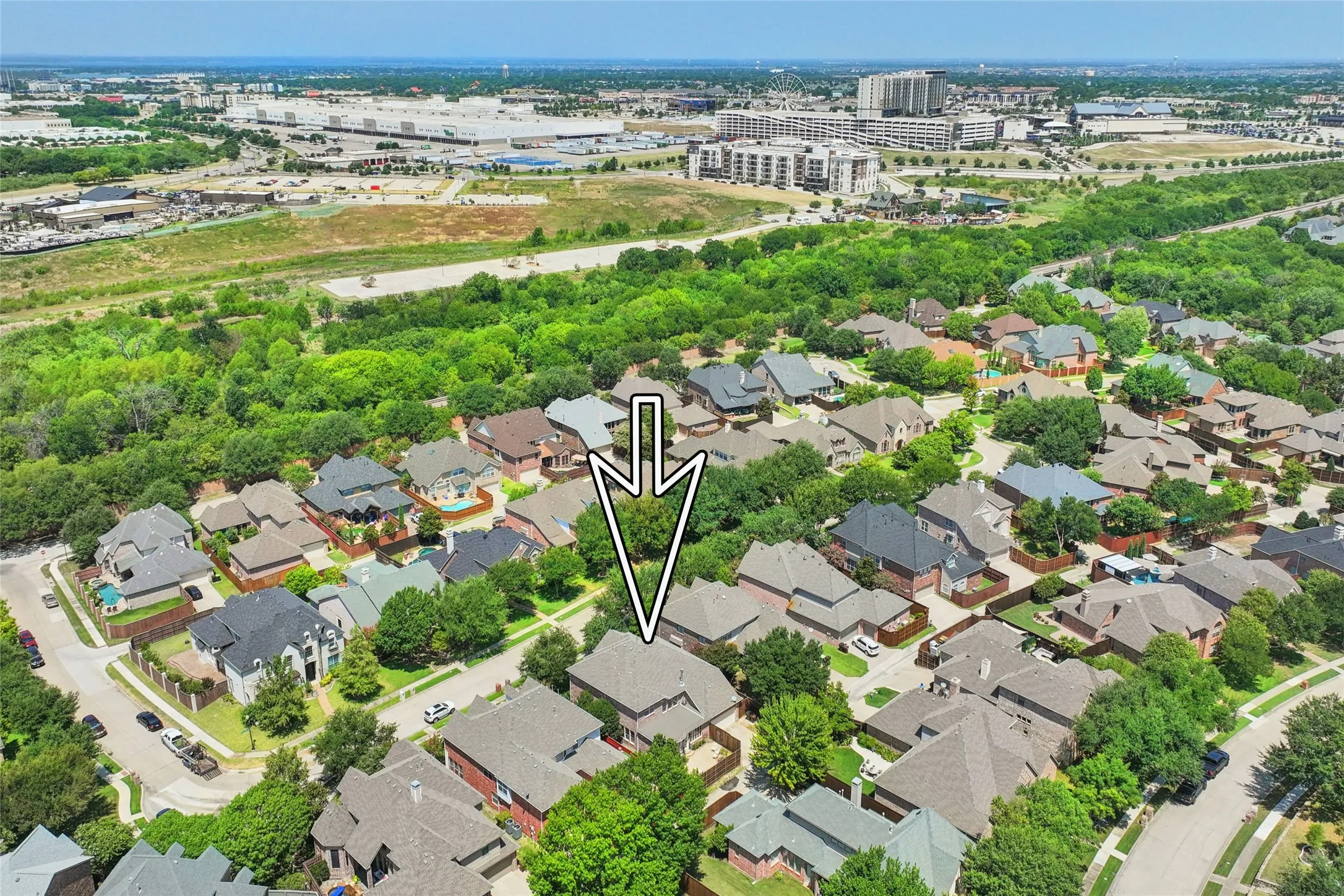 Residential neighborhood with mature trees and established homes