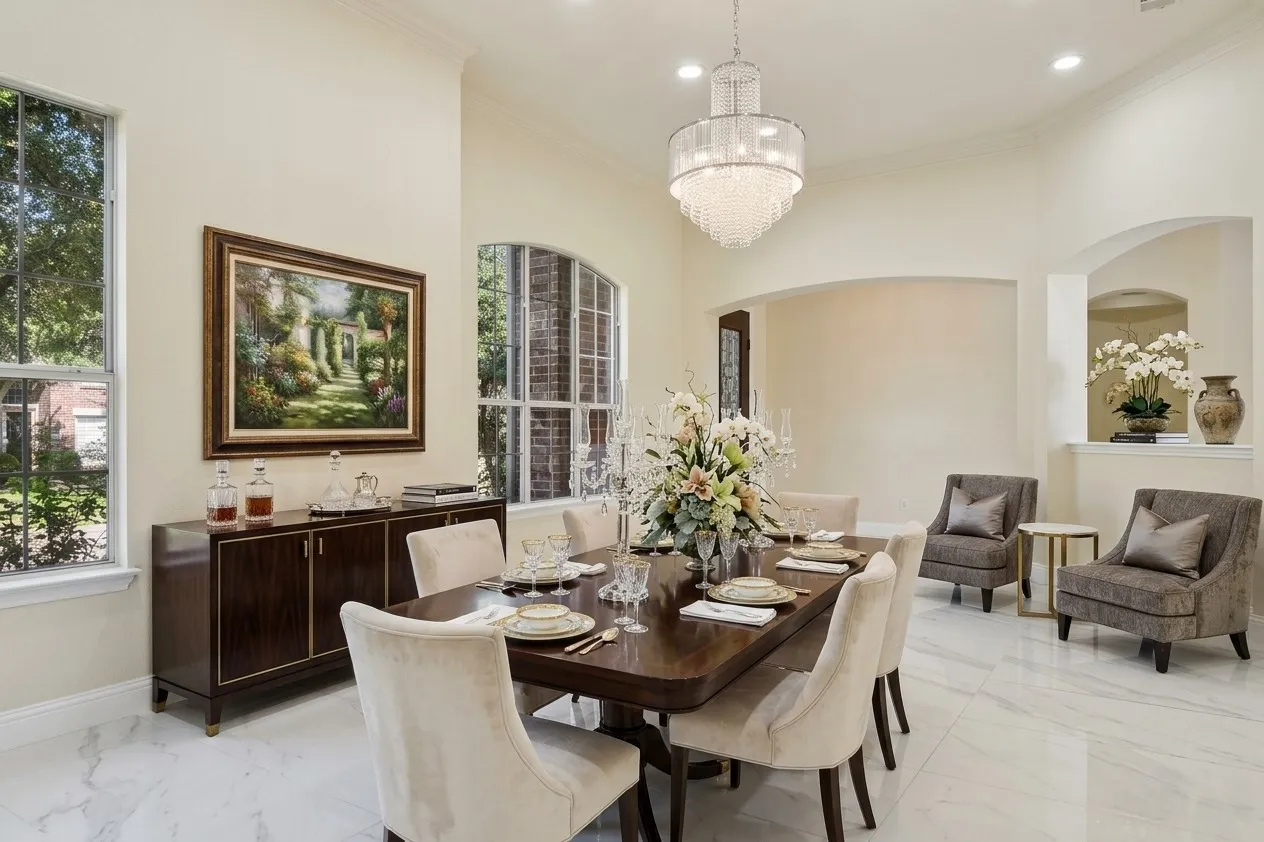 AI Staged, Polished tile flooring, recessed lighting, arched doorways, and a tiered crystal chandelier