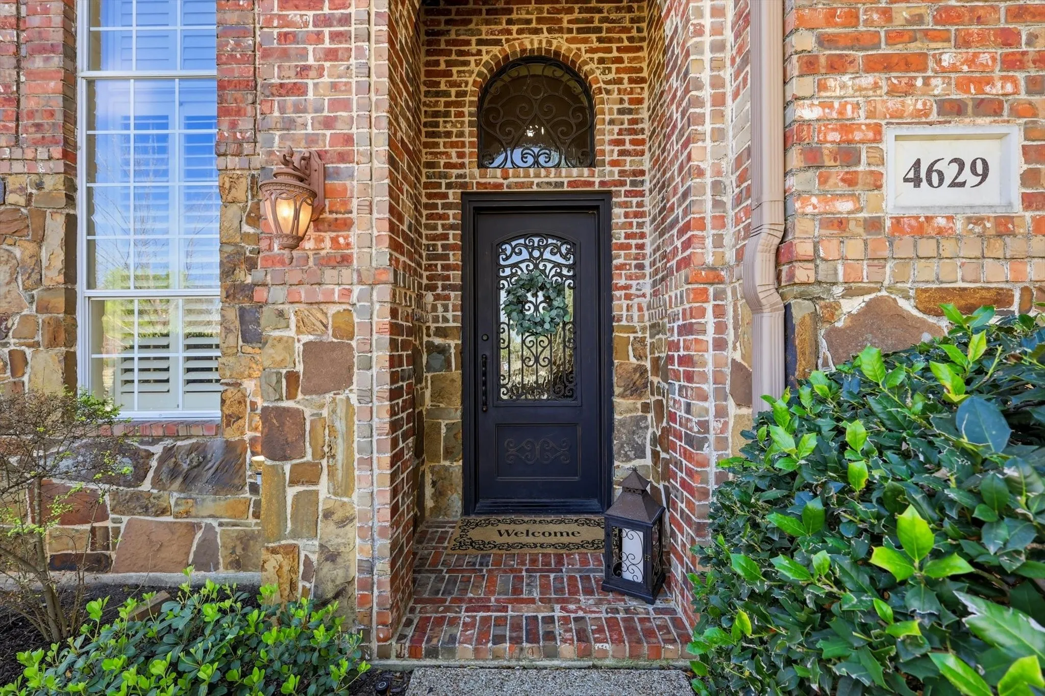 Gorgeous custom iron and leaded glass front door entry