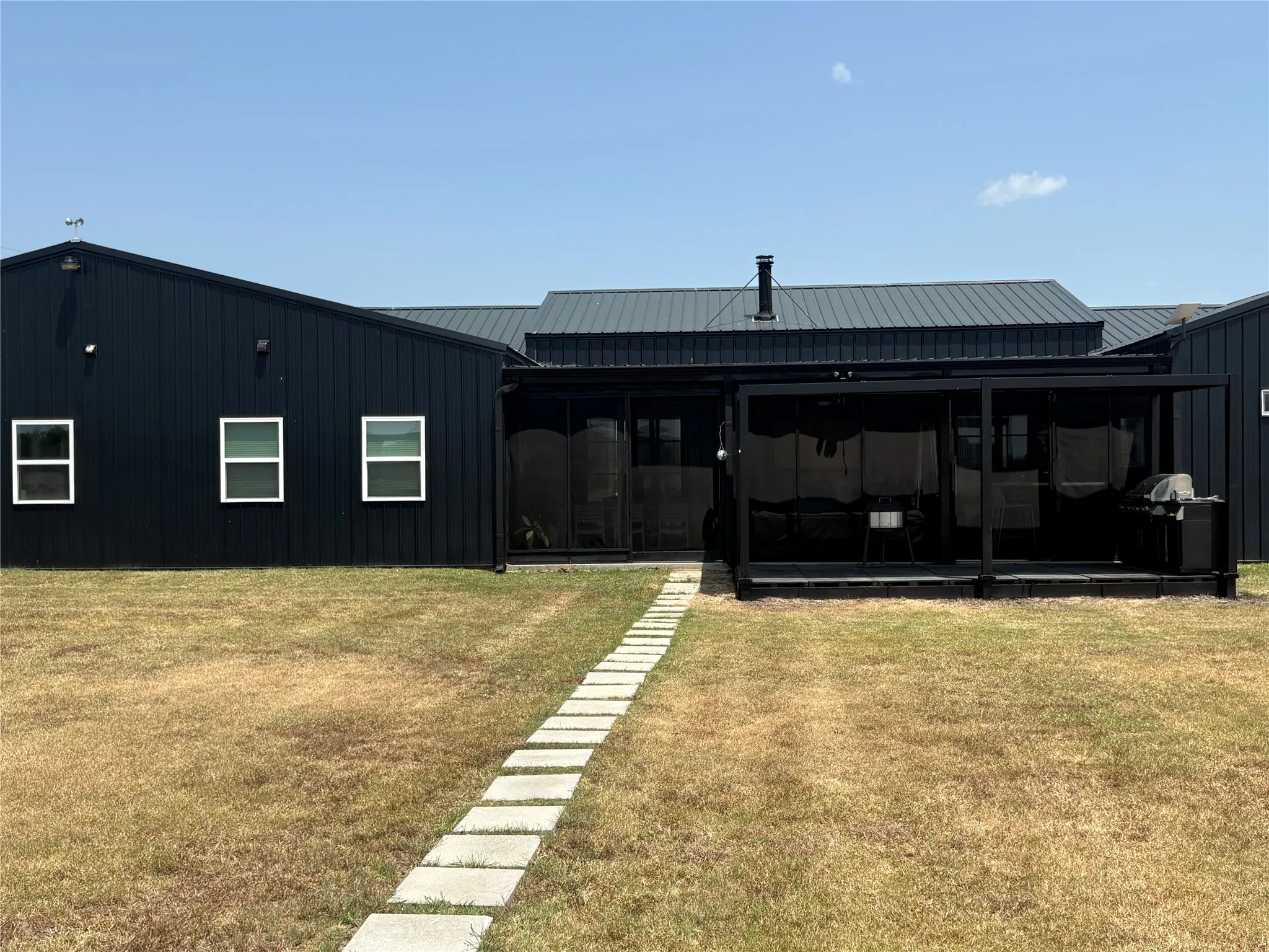 Back of home and Pergola BBQ Area