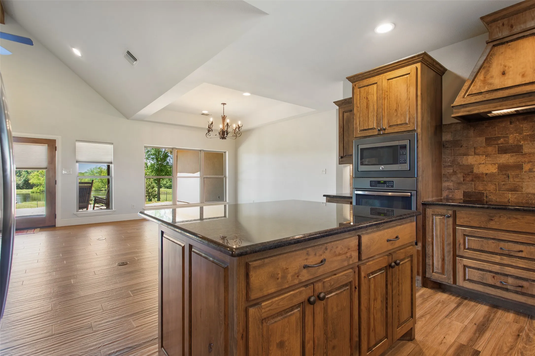 VIEW FROM KITCHEN TOWARD DINING