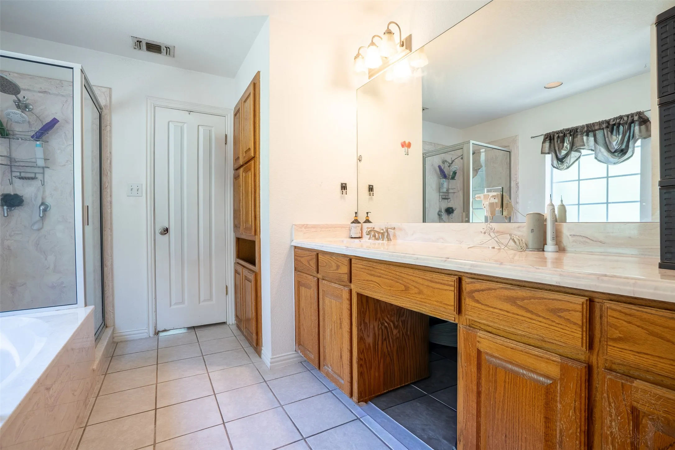 Nice size counterspace and large vanity mirror