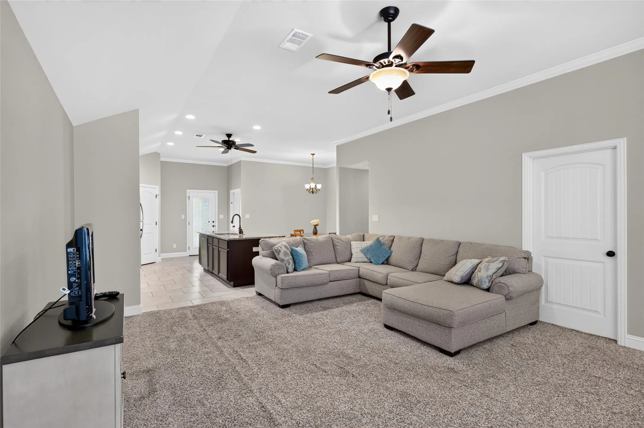 Living room looking into kitchen