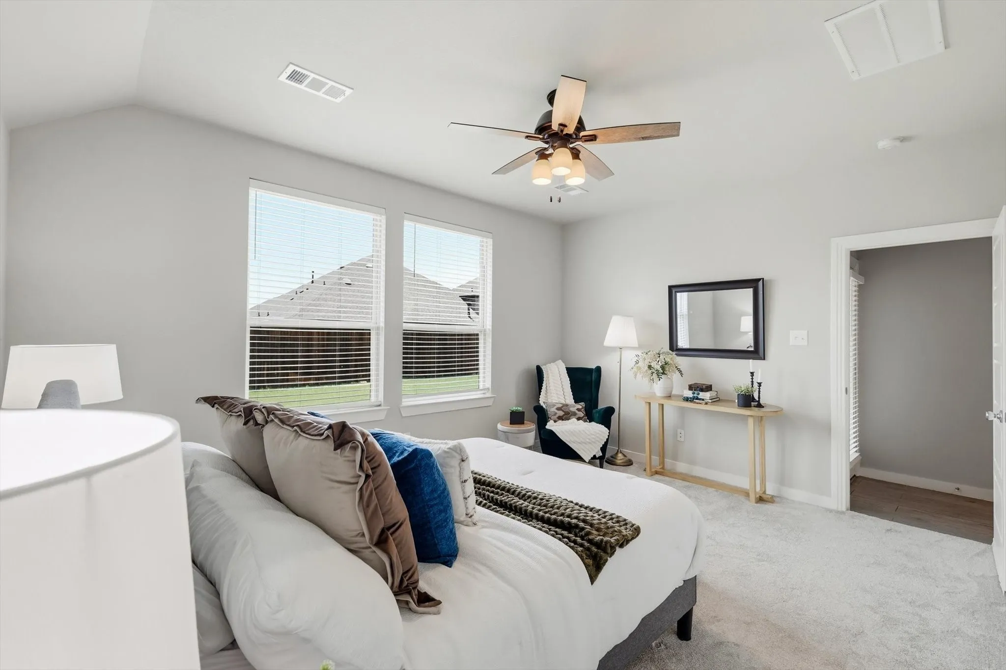 MASSIVE private primary bedroom with natural light ceiling fan and ensuite bathroom!