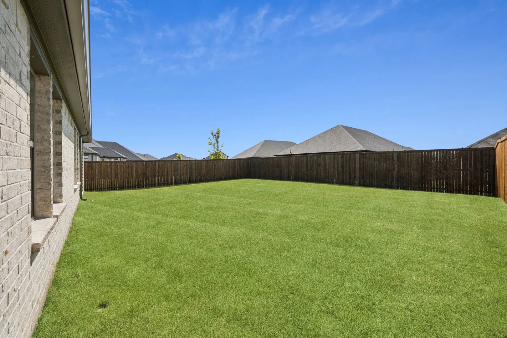 Covered Patio in the Heisman home plan by Trophy Signature Homes – REPRESENTATIVE PHOTO