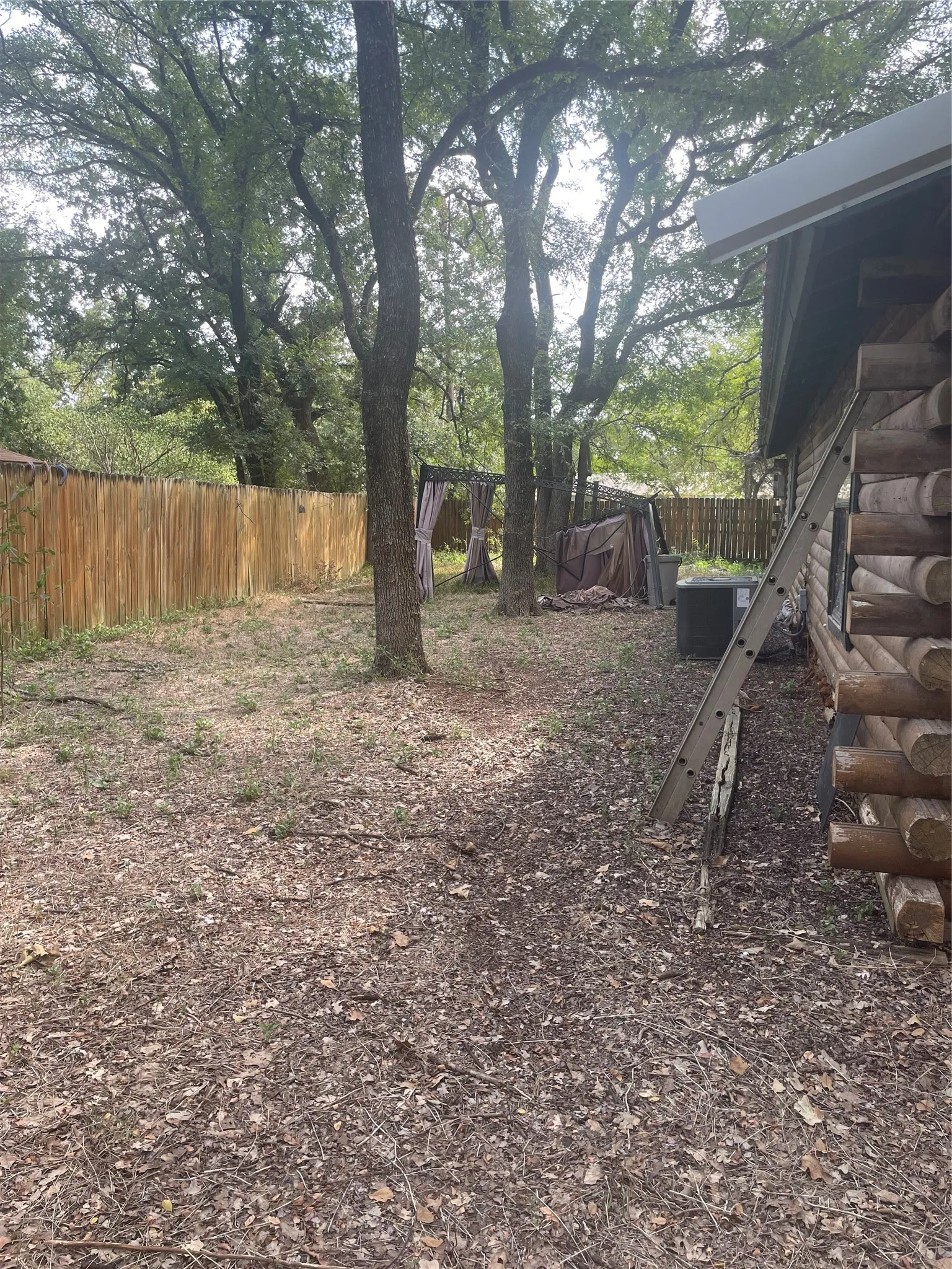 partially fenced backyard