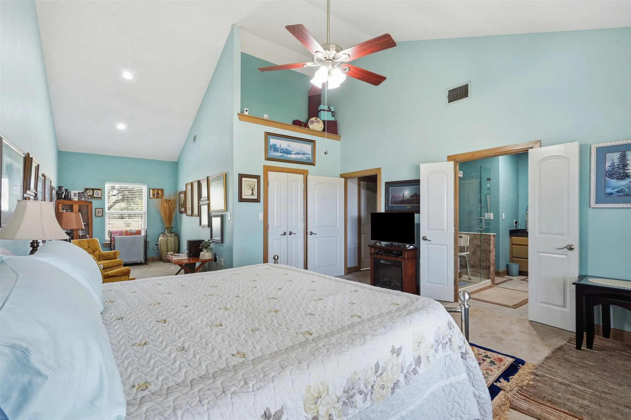 Primary large bedroom with cozy sitting area
