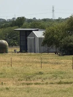 Secondary 30'x40' barn in middle pasture with large implement barn 30'x60'