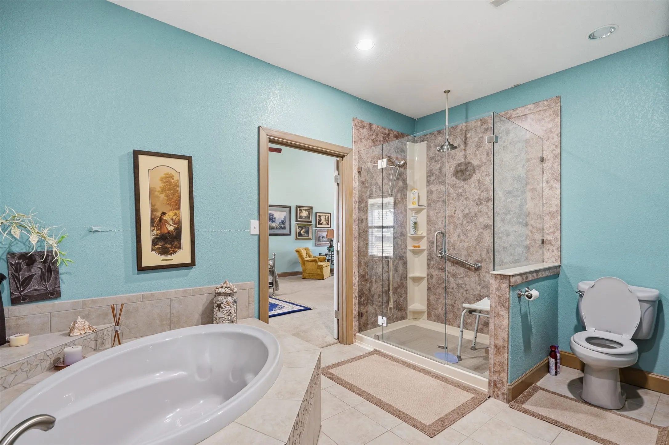 Primary bedroom with updated shower
