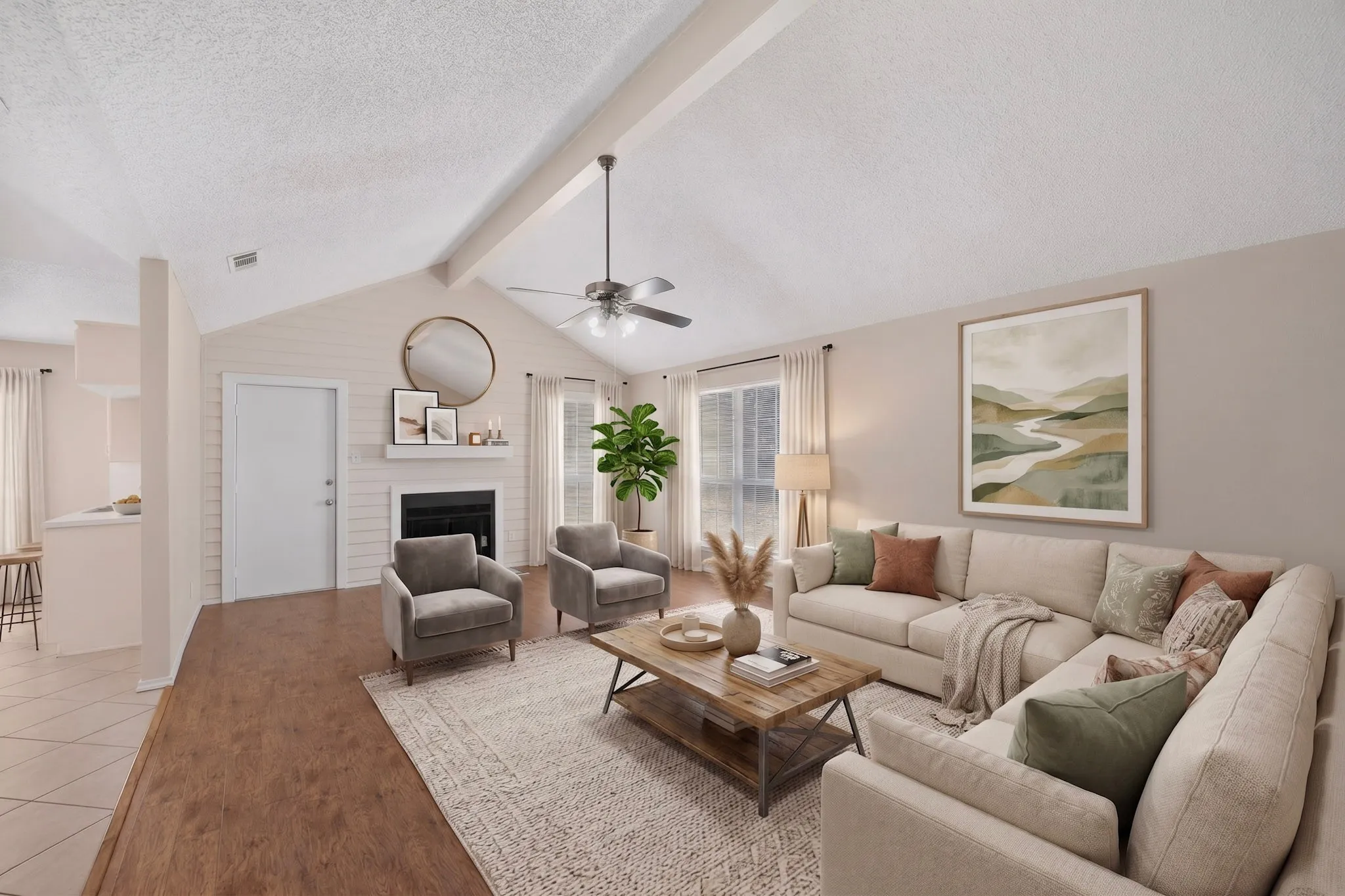 Vaulted ceiling with exposed beam, wood-finish flooring, fireplace with mantel, ceiling fan, and large windows