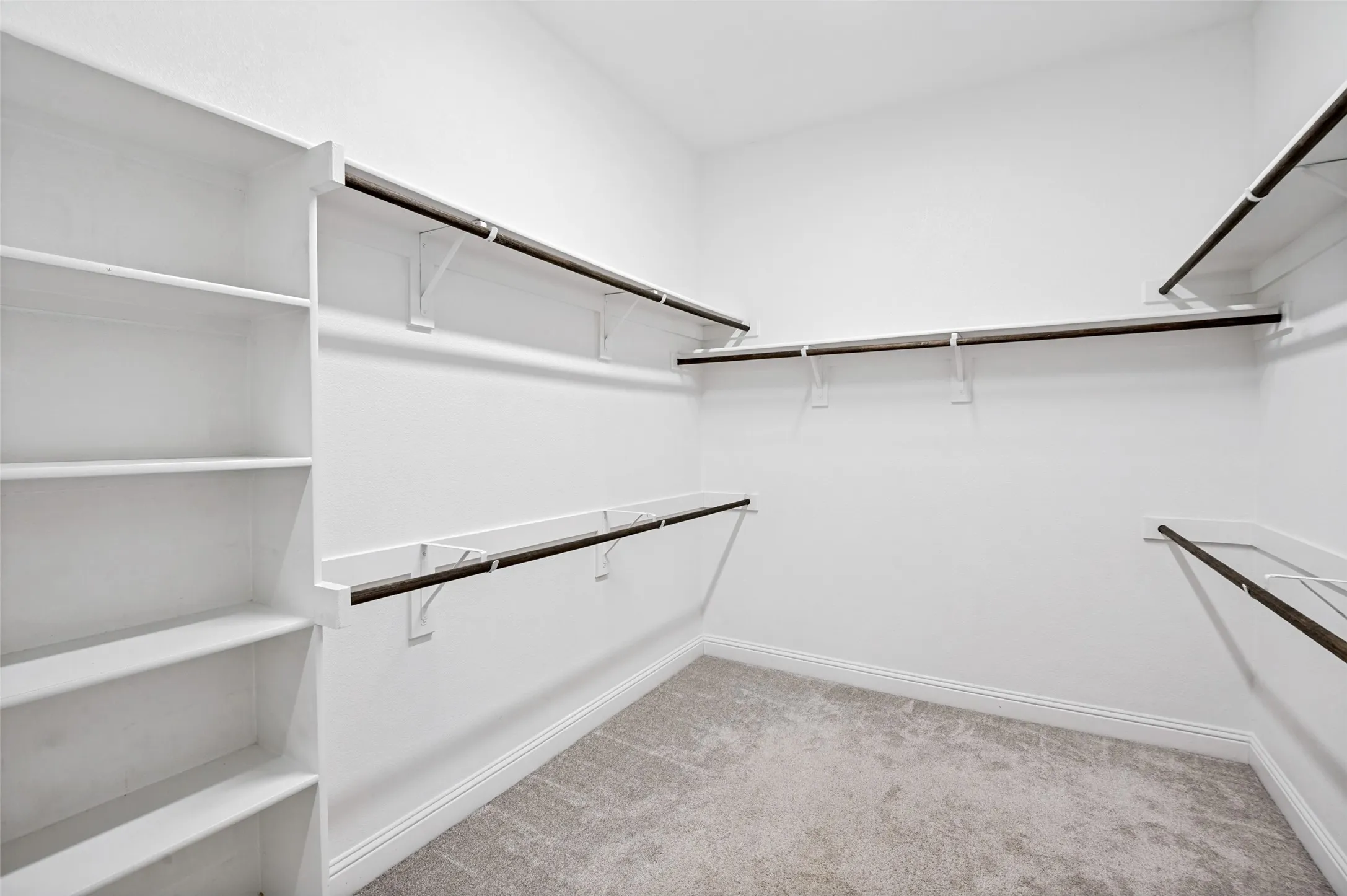 primary bedroom walk-in closet
