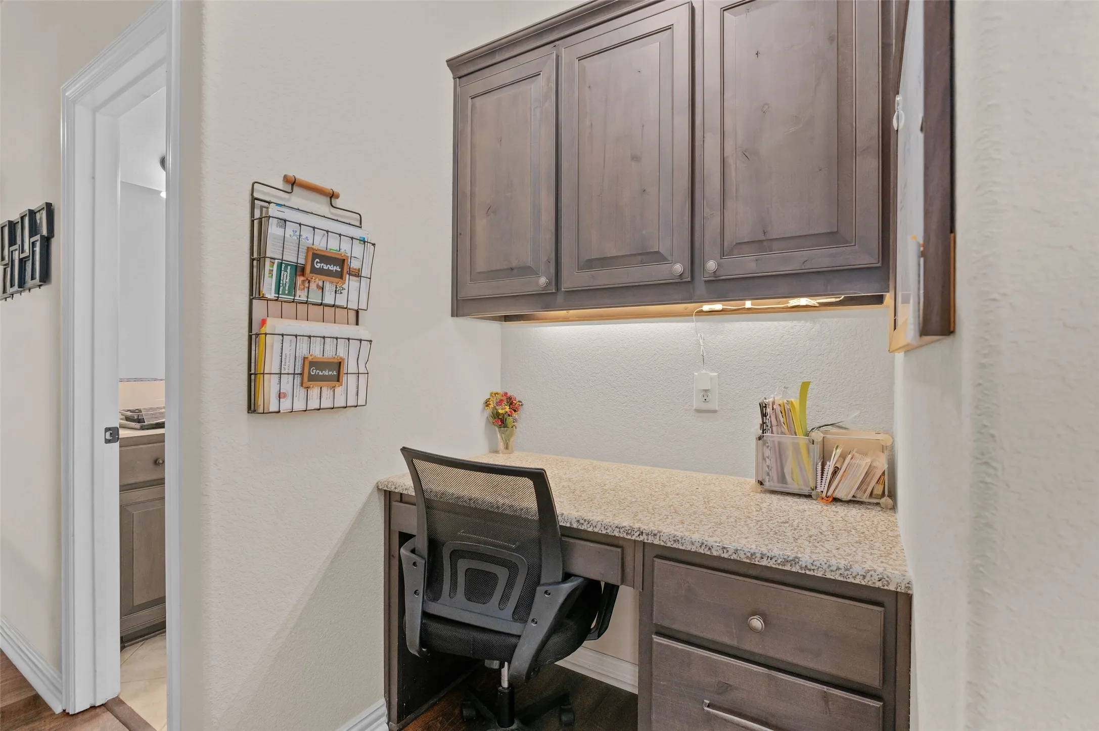 Desk area in hallway with secondary bedrooms.