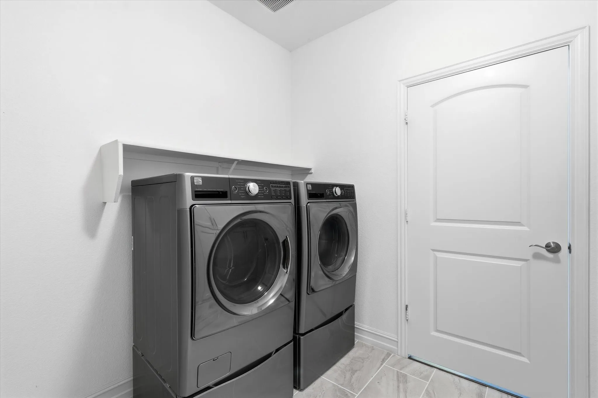 Room for a Fridge as well in the laundry room.