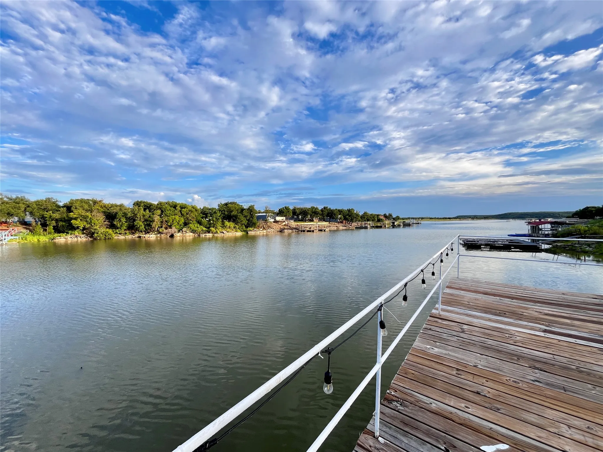 Expansive upper dock deck provides the ideal place to fish, sunbathe, or simply take in the panoramic waterfront views.