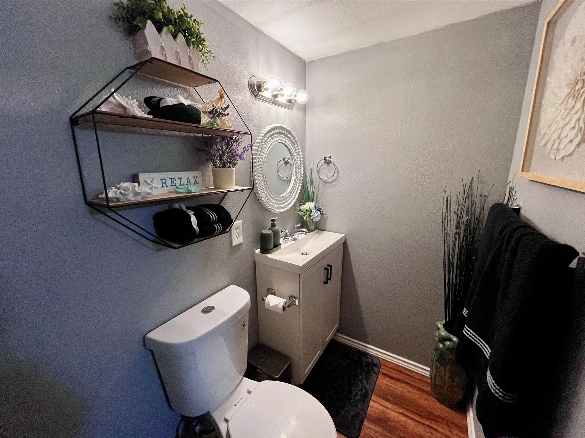 Remodeled ensuite bath featuring a modern vanity and stylish finishes.