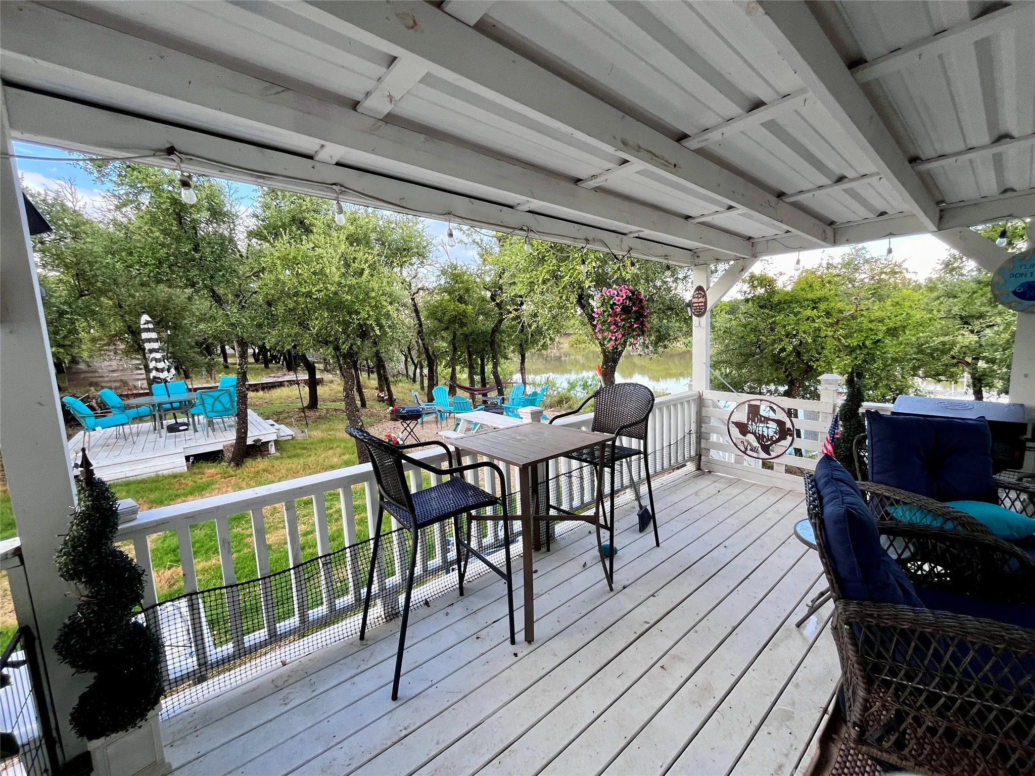 Outdoor serving area creates the perfect spot for hosting backyard barbecues and lakeside celebrations.