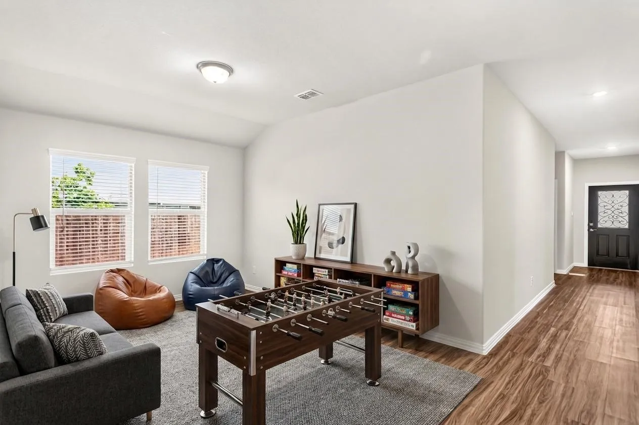 Same room as the dining room photo. Can be utilized as an office or enclose for a media/gameroom room or fifth bedroom