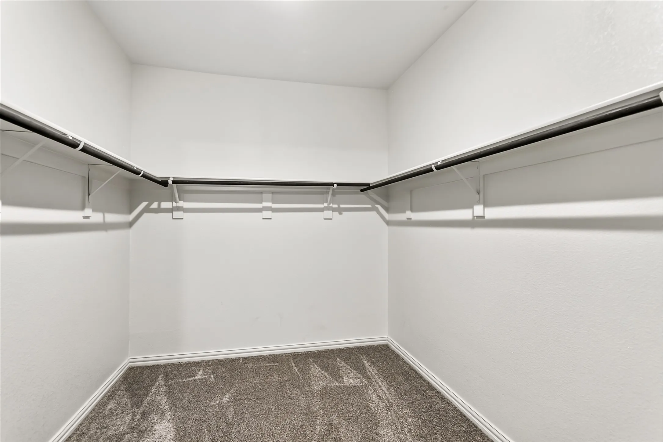 Large primary bedroom walk-in closet