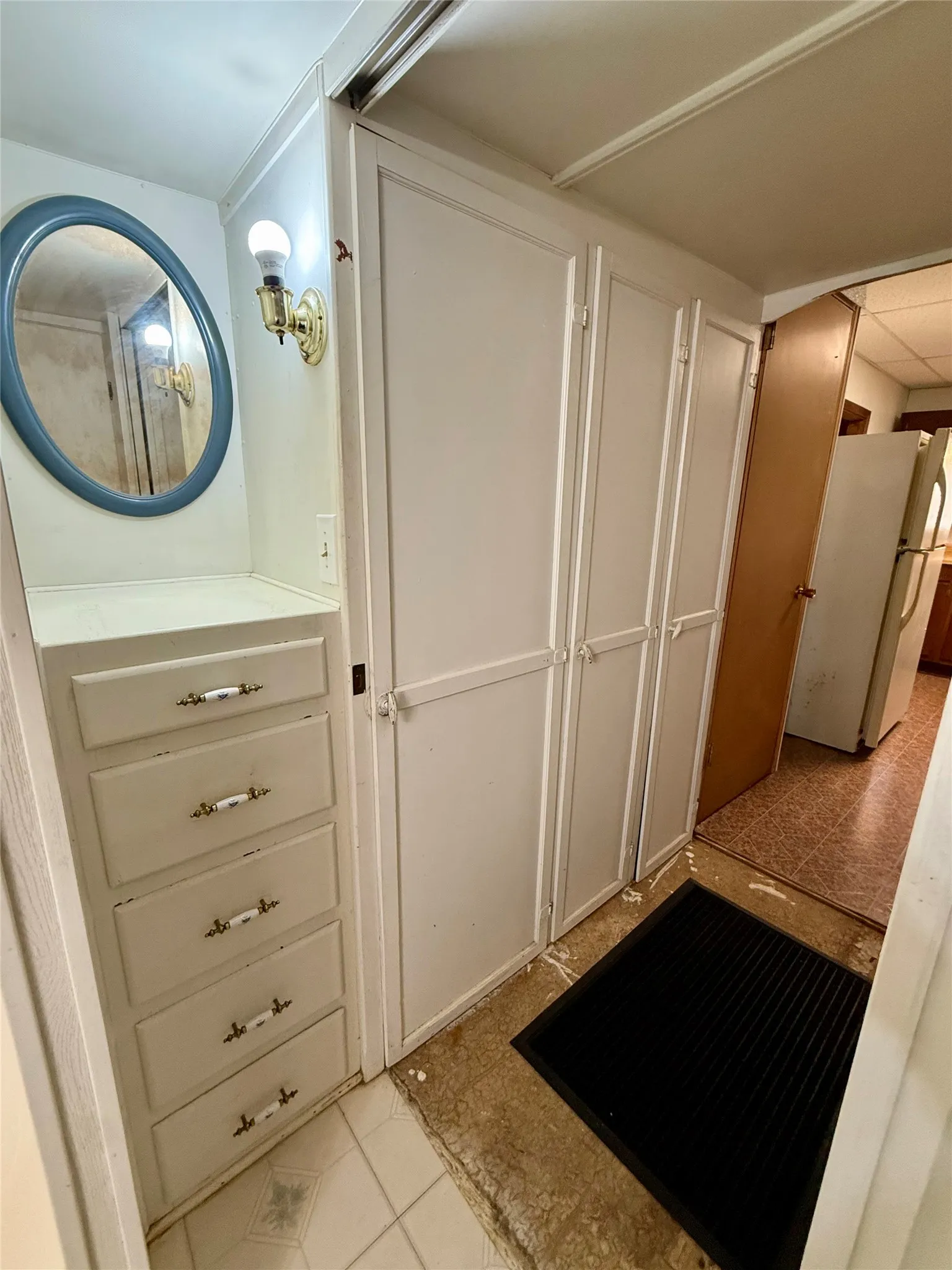 transition from bathroom to kitchen area