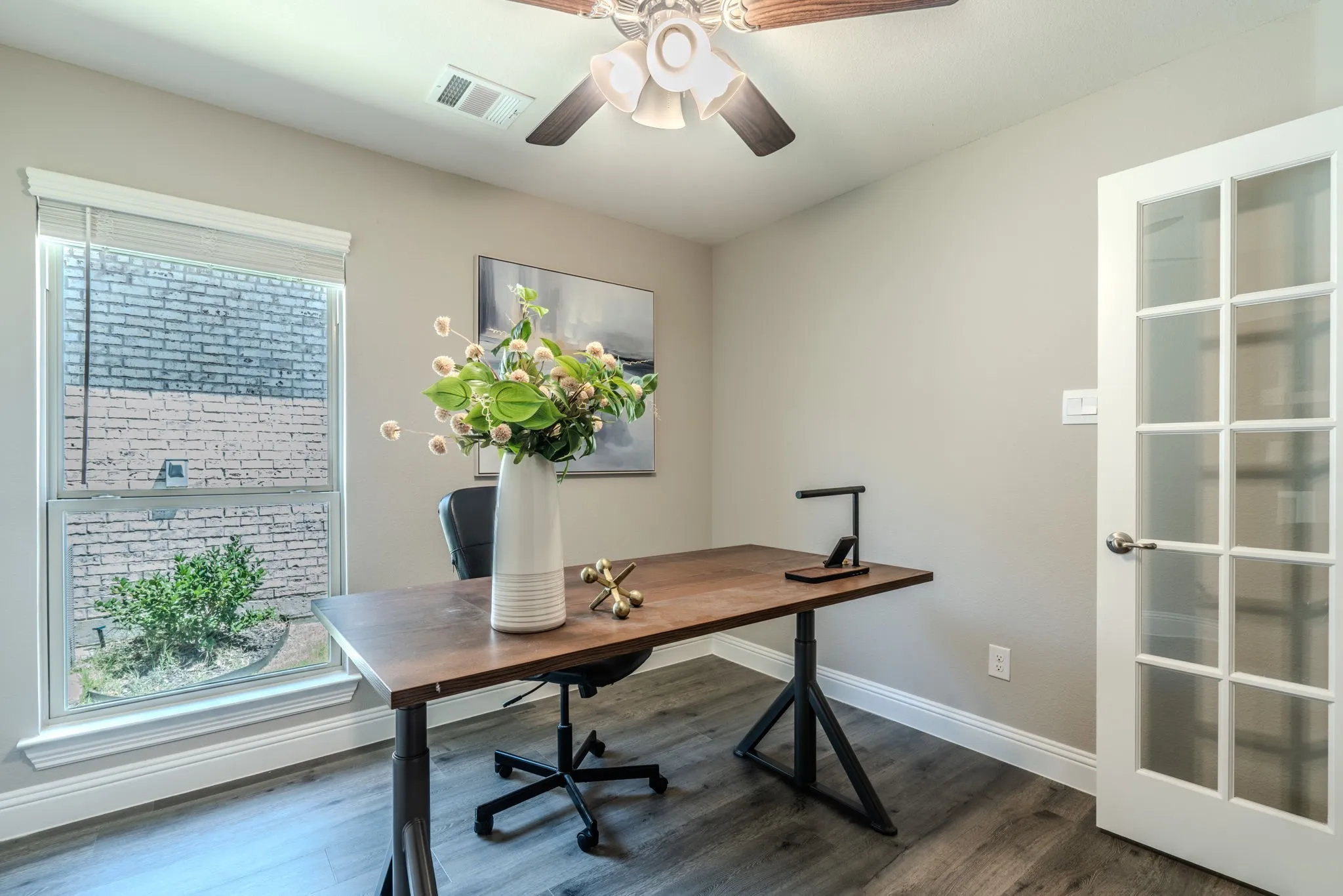 7329 Allium Court, Little Elm, TX 76227 - office - Wood-finish flooring, white trim, and a ceiling fan with integrated lighting