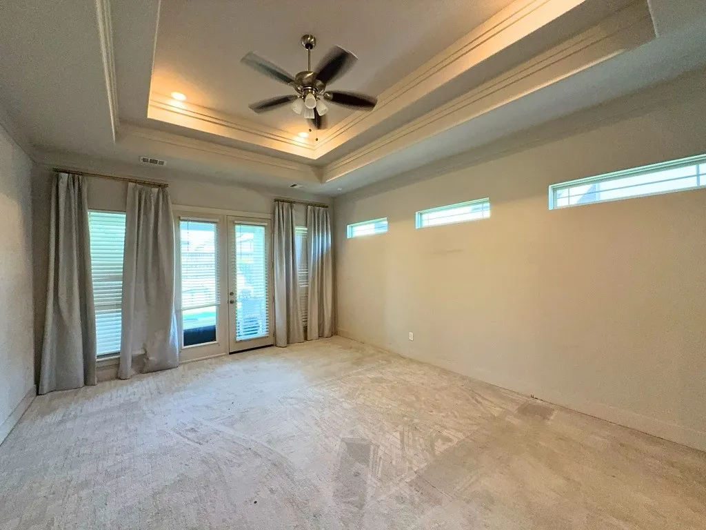 Primary bedroom with backyard access