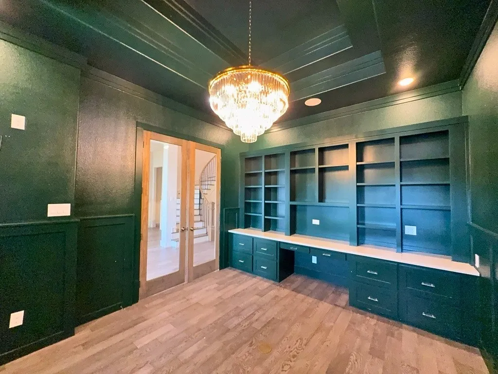Private study with built-in desk and bookshelves
