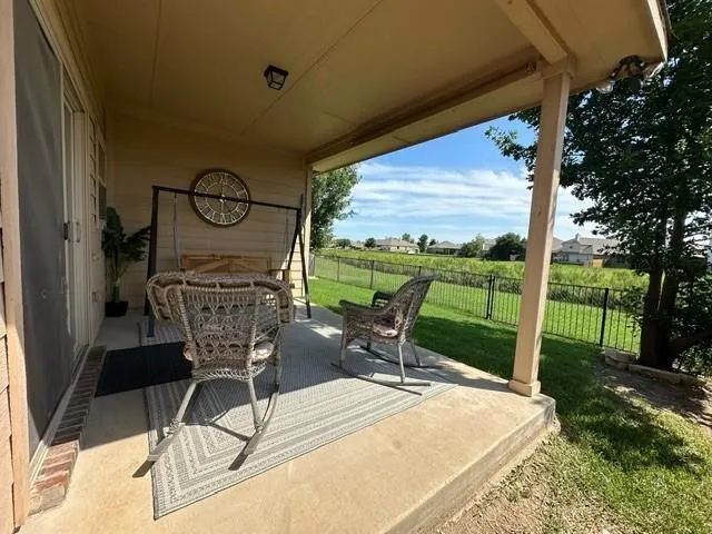 View of patio / terrace featuring fence