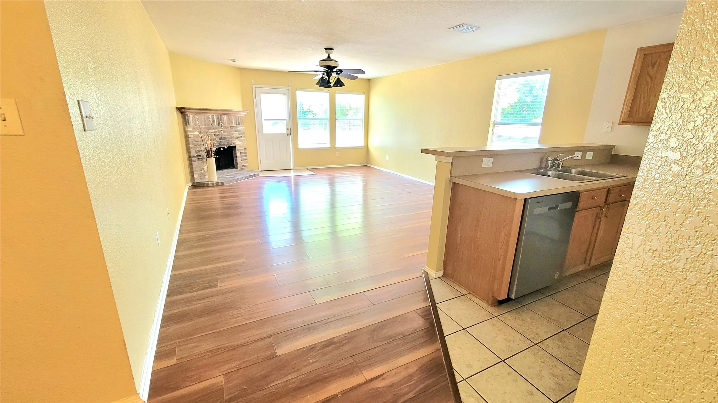 Wood-finish flooring throughout the main living area