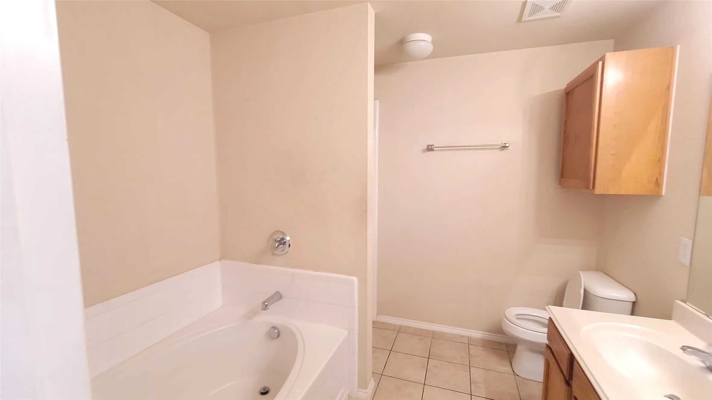 Built-in bathtub with chrome fixtures
