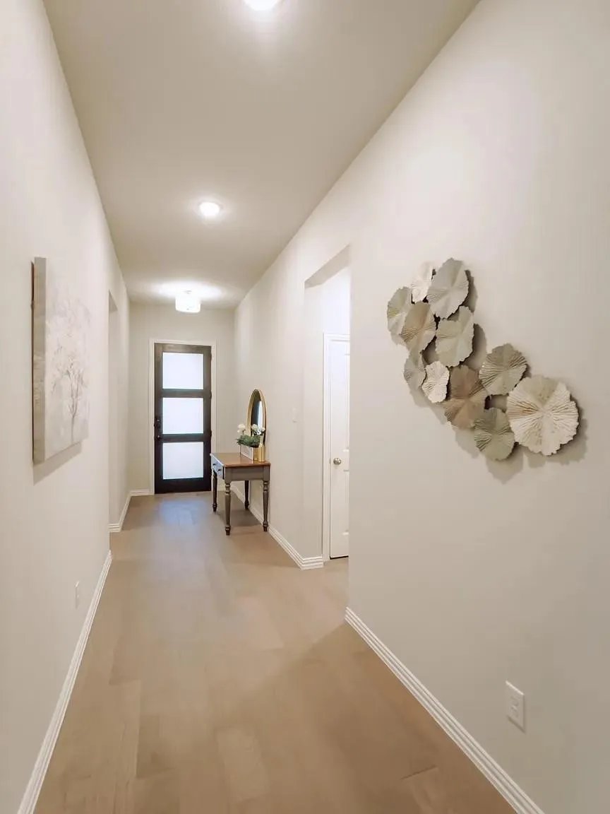 Entryway featuring wood-finish flooring, recessed lighting, and neutral wall tones