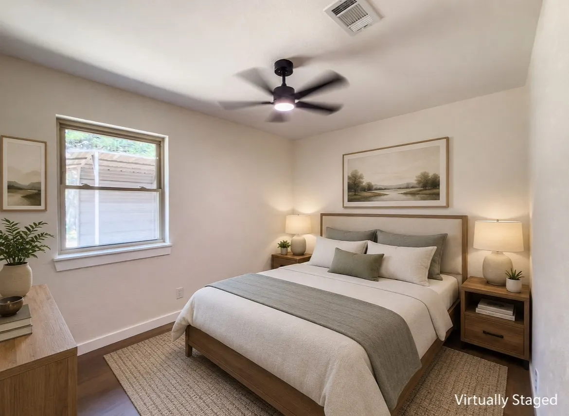 Bedroom featuring a ceiling-mounted fan, recessed ventilation, wood-finish flooring, and a single window with white trim