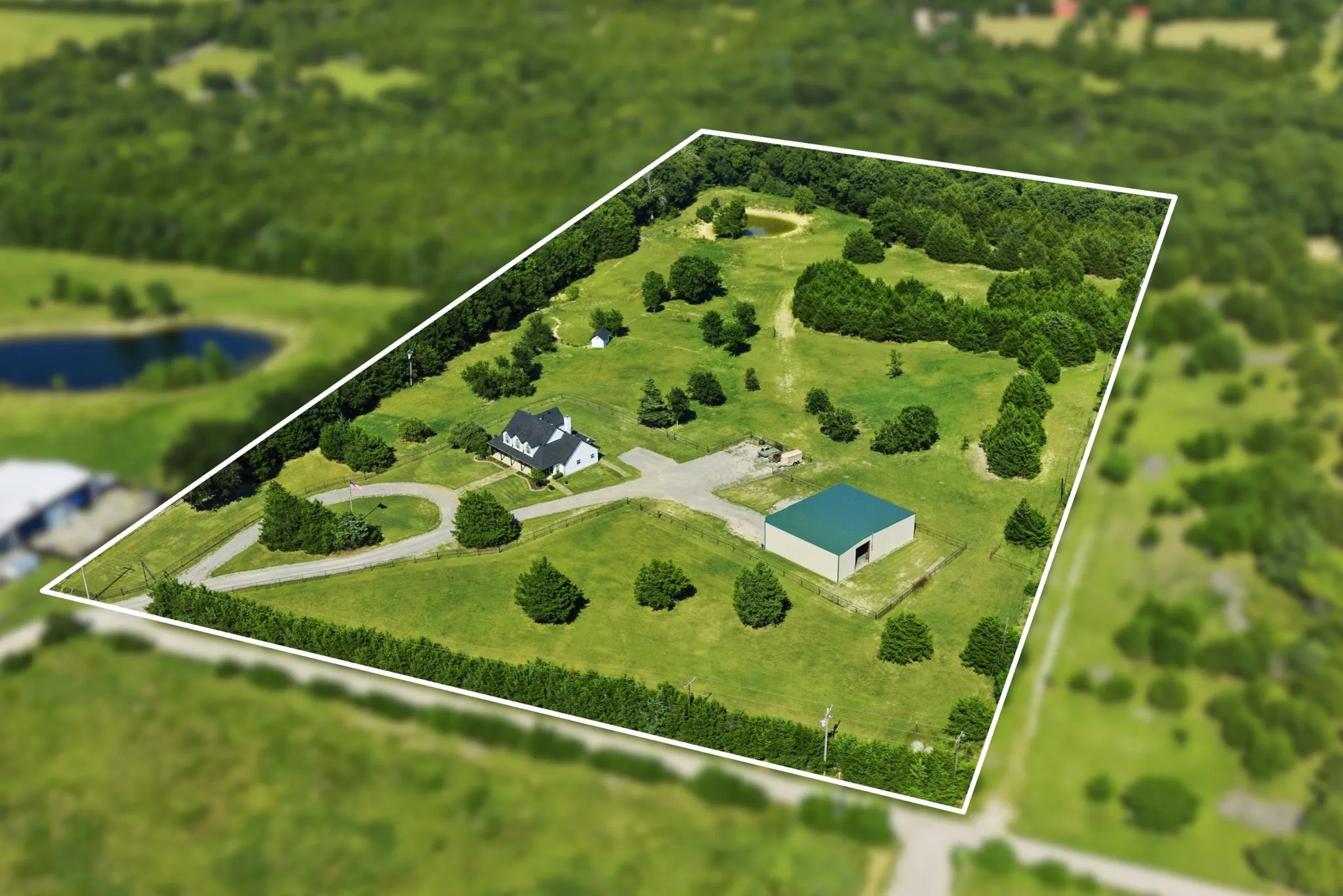 Framed by mature trees along much of the boundary, the outlined 10.4 acres blend open pasture, a seasonal pond tucked toward the back left, a welcoming farmhouse, and a spacious workshop for a picturesque setting with room to live, work, and unwind.