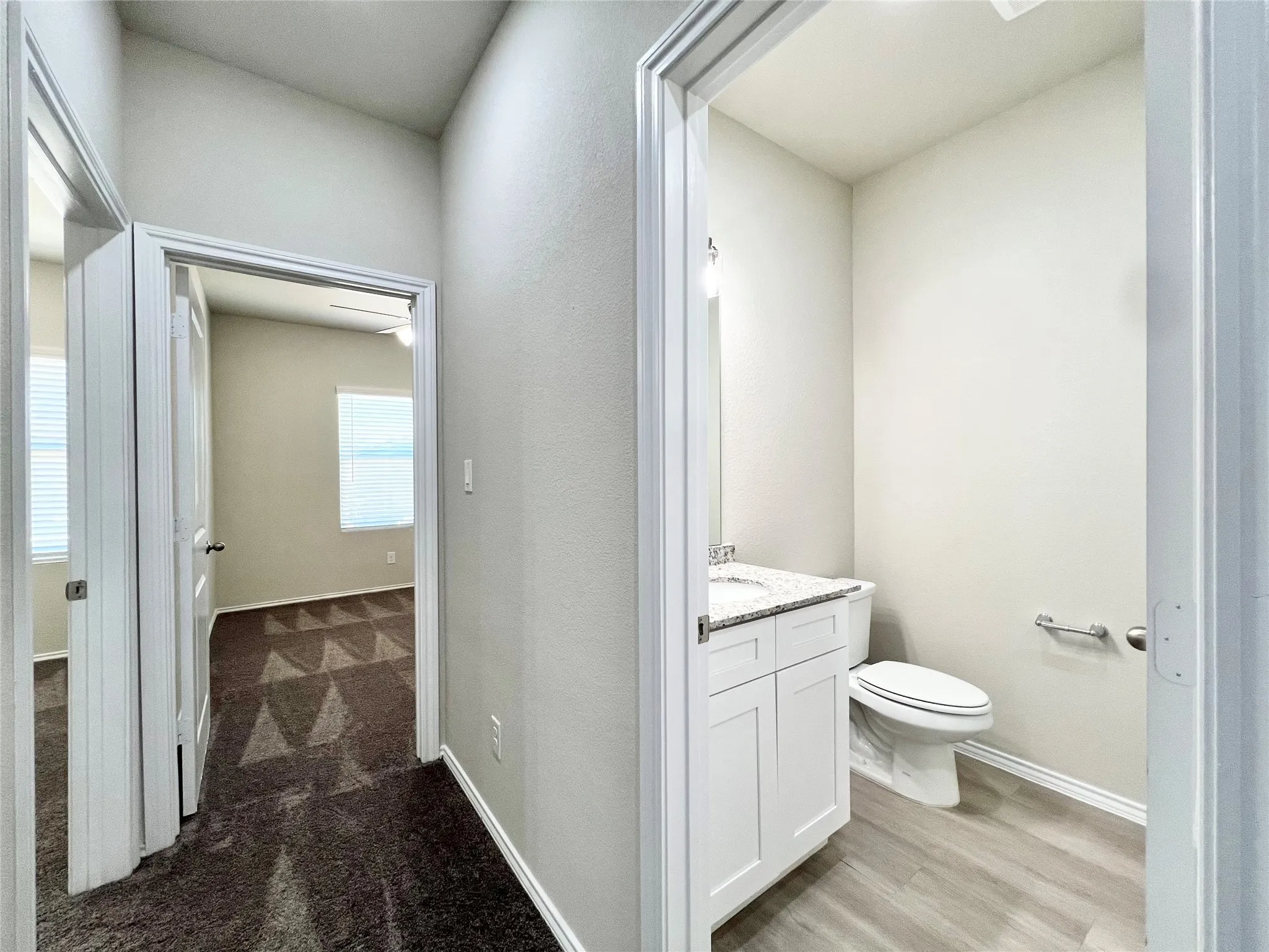 Hallway to 3rd bedroom and full bathroom
