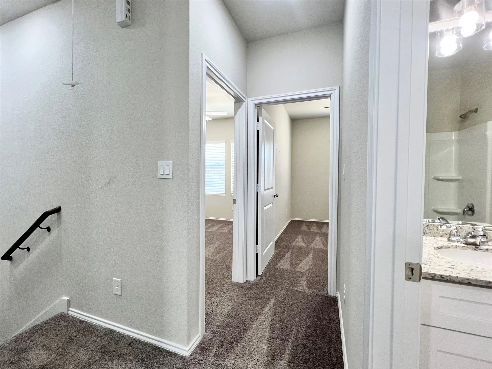 Top of stairs to 2nd and 3rd bedroom