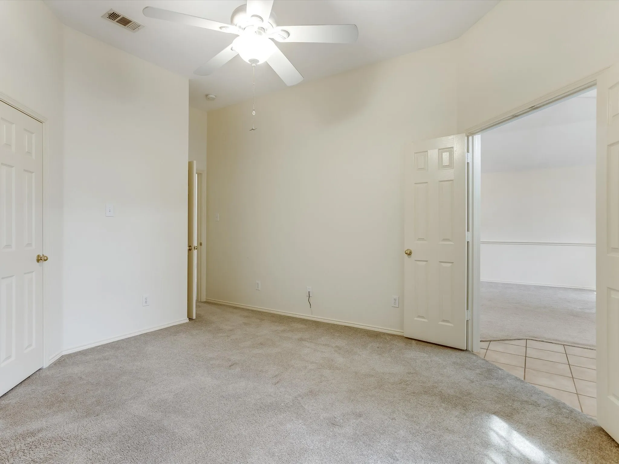 Flex room, office, or extra bedroom off of the front of the home