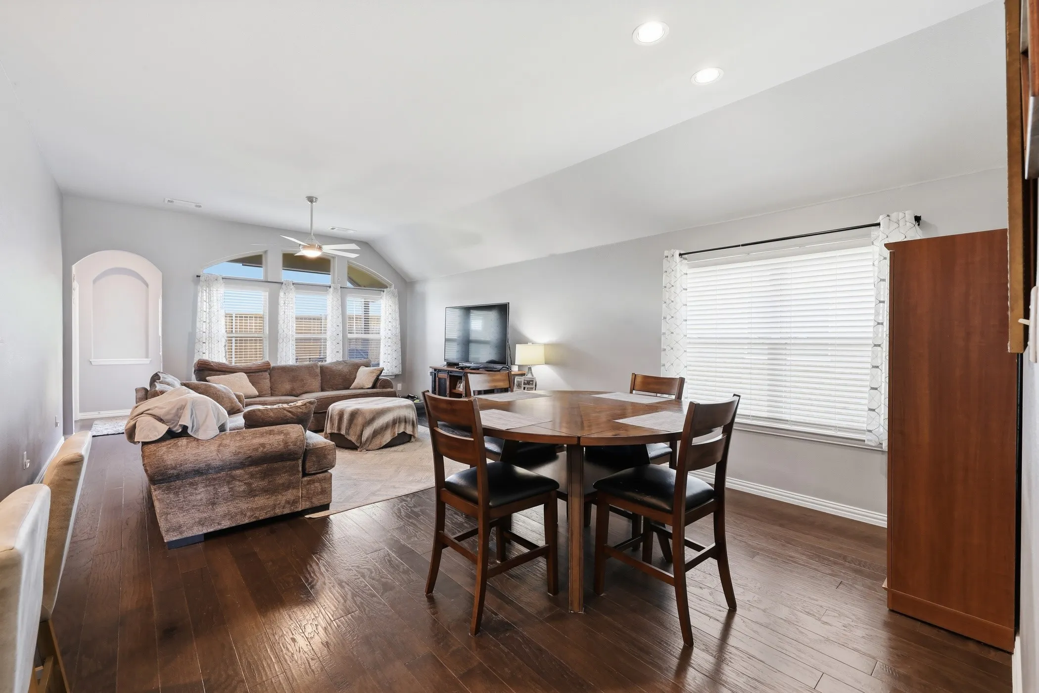 Open-concept showcasing the dining room and living room