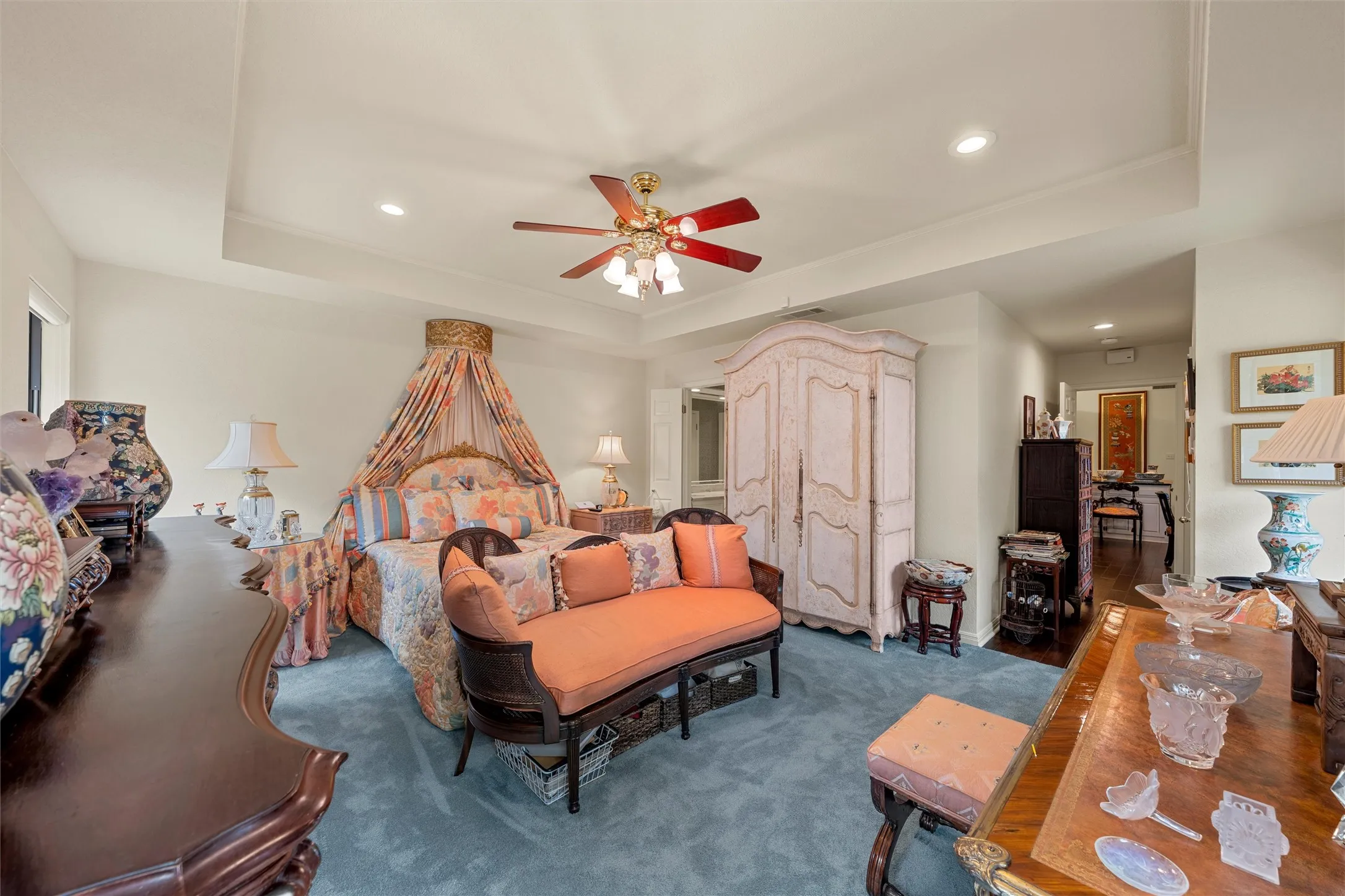 Recessed lighting and ceiling fan overhead