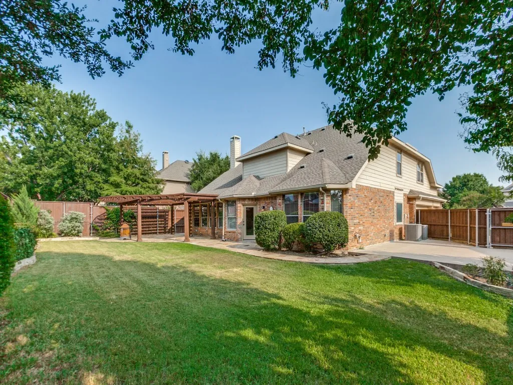 Spacious outdoor living space and extra parking pad