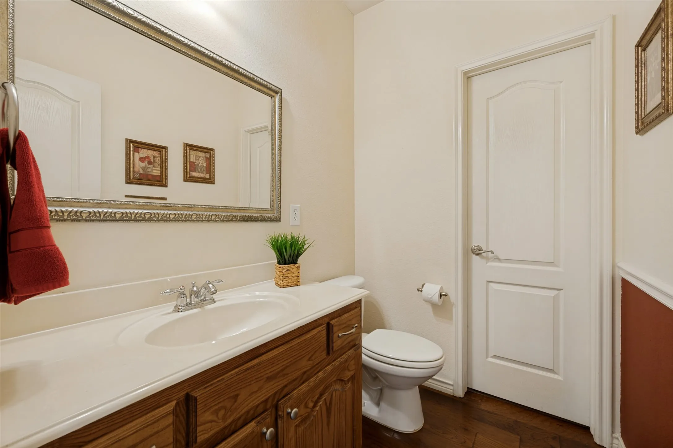 Half bath downstairs with a huge wrap around closet
