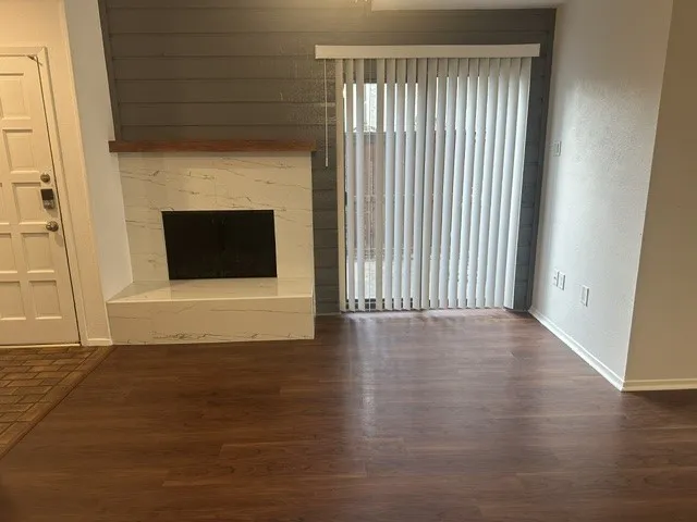 Tiled fireplace in open living room