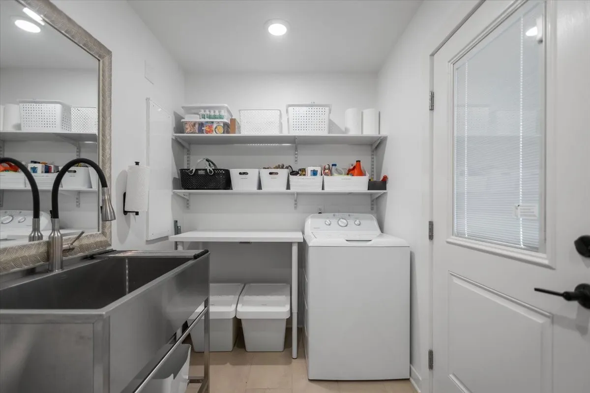 Outdoor Guest bathroom with laundry and shower, great for a future pool or pets