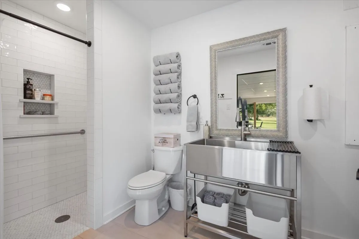 outdoor Guest Bathroom with full laundry