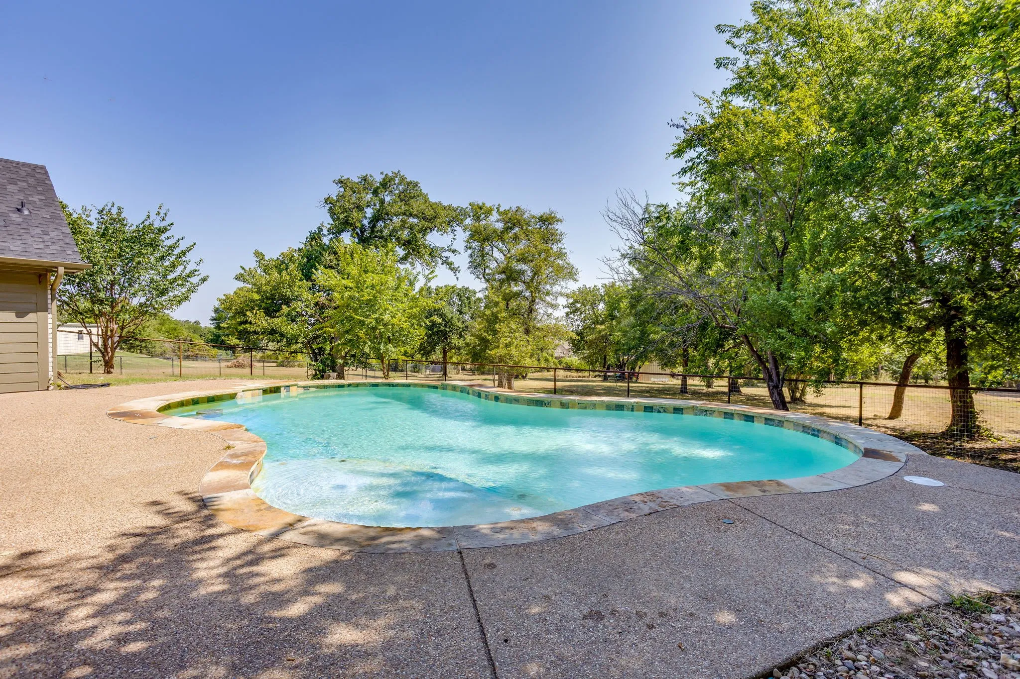 In-ground gunite pool w/barstool seating