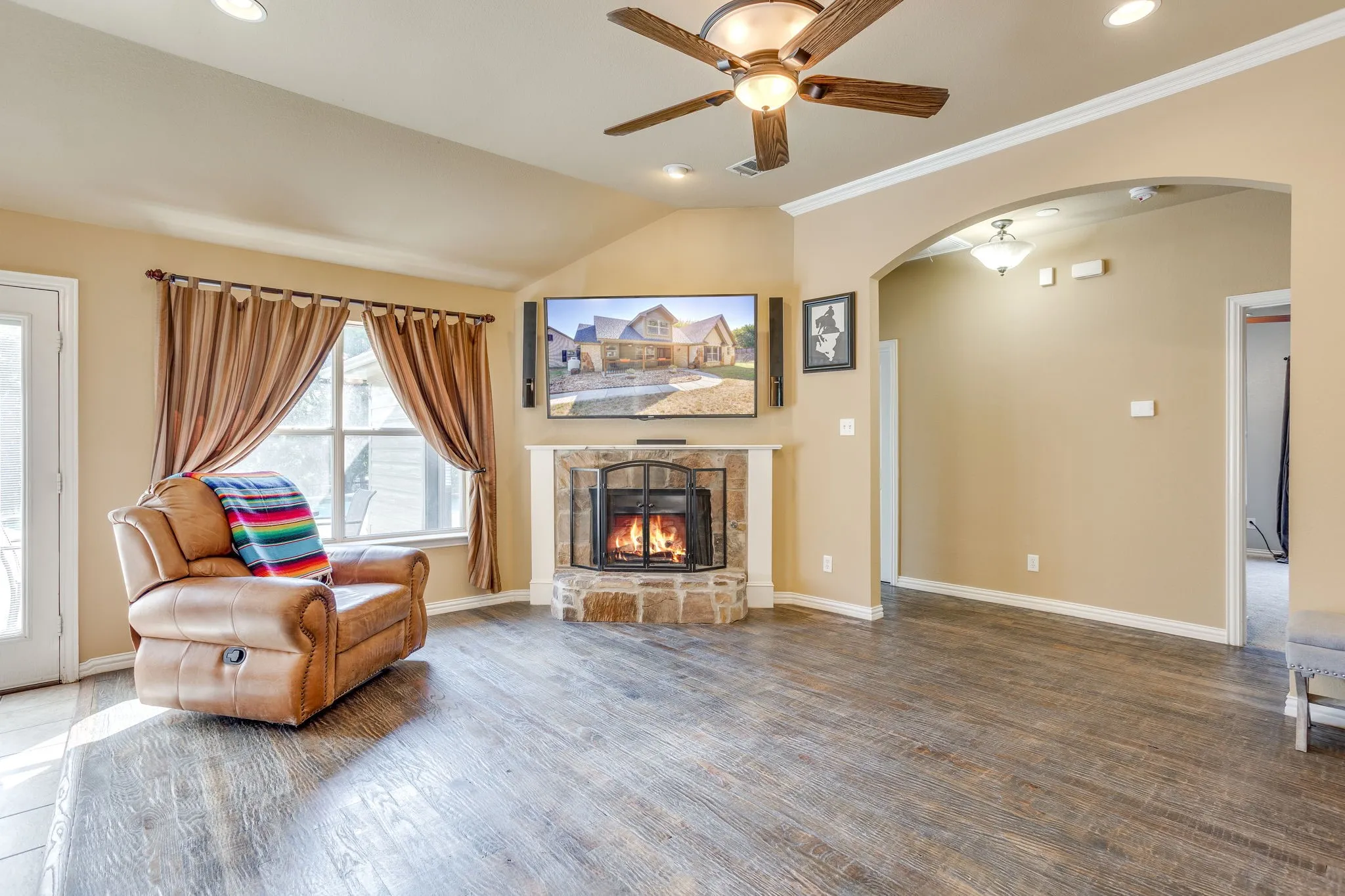 Handscraped hardwood flooring in the living room and hallway
