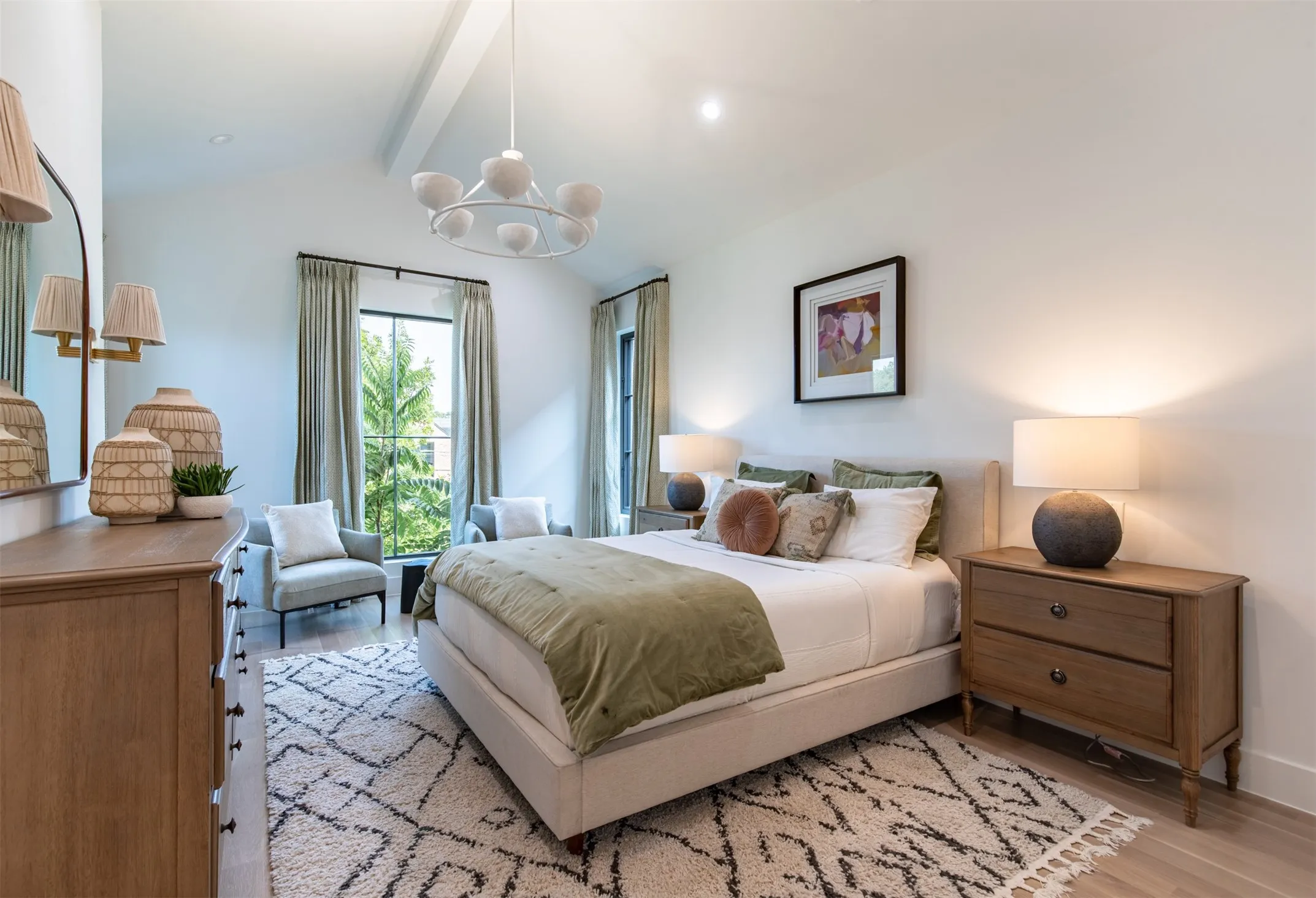 Room featuring vaulted ceilings with exposed beams, wood-finish flooring, two large windows with dark trim, and a contemporary chandelier