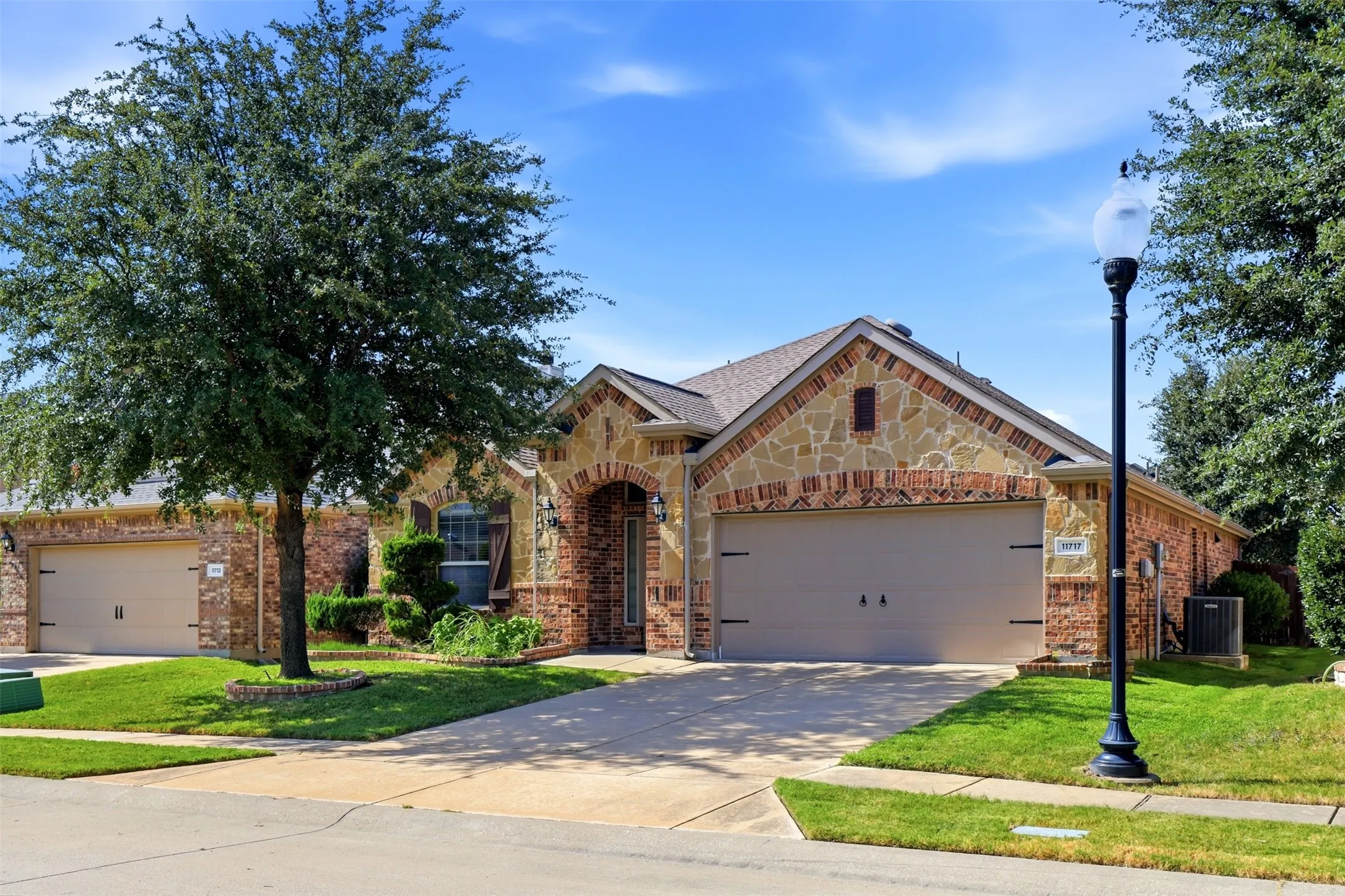 Stone and brick exterior with arched entryway