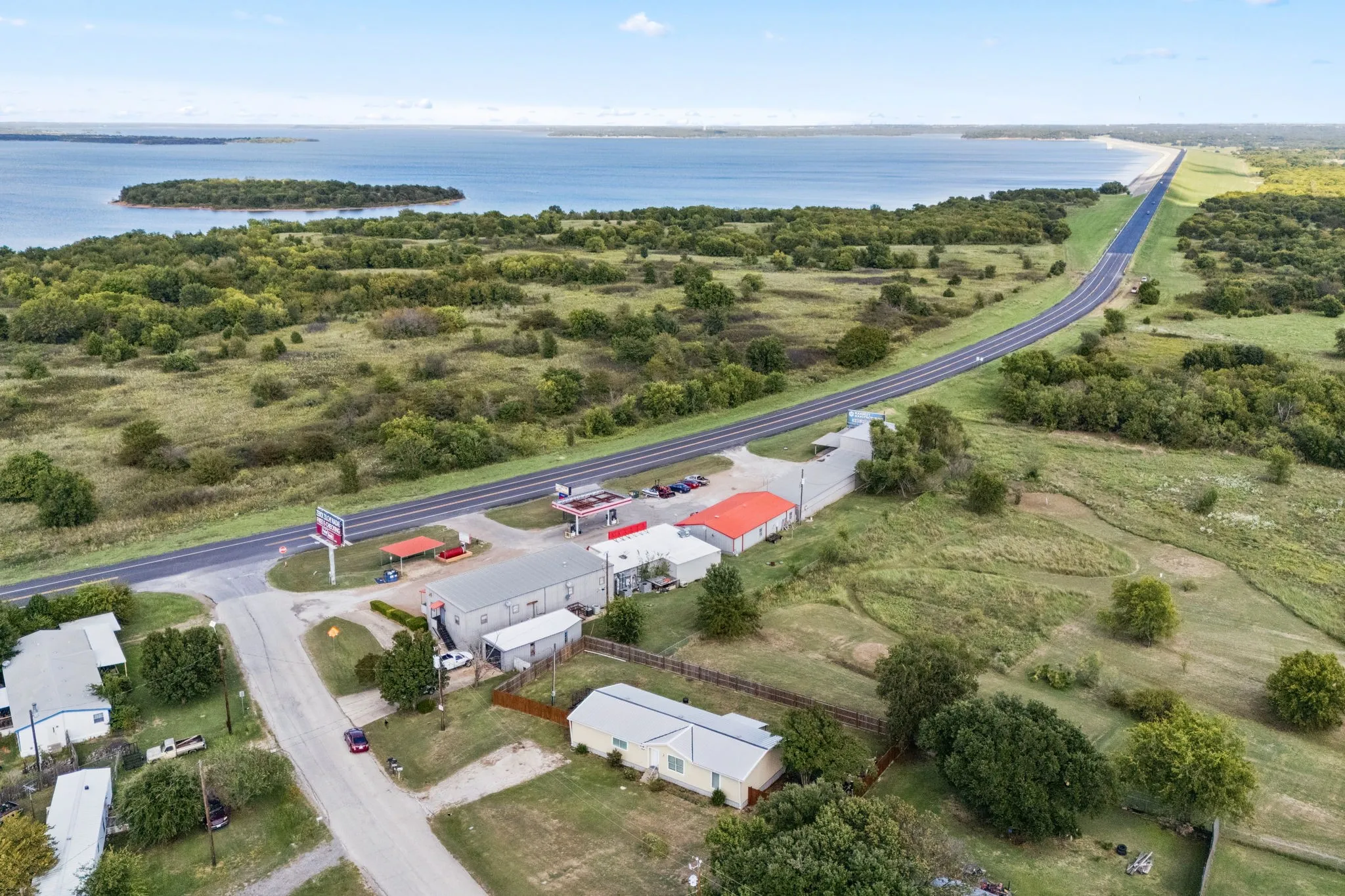 Aerial view of front with Lake Ray Roberts in the background